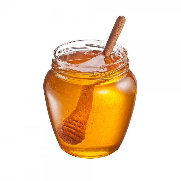 drewniana łyżka do miodu w słoiku miodu
